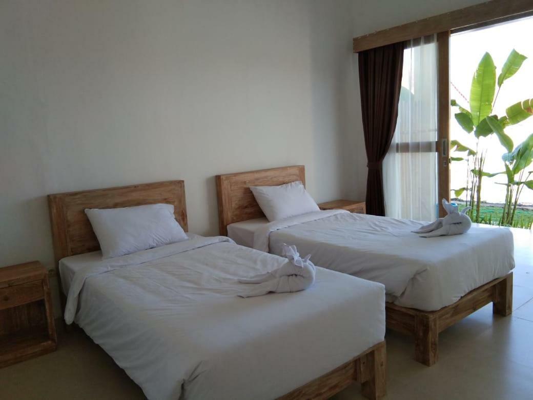 Padi Guest House 케라마스 외부 사진